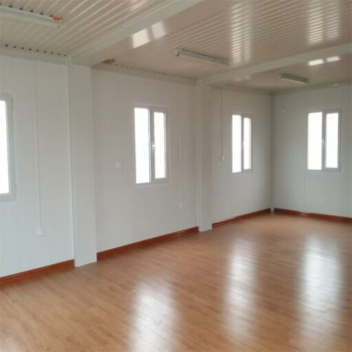 Interior view of the Barn Homes Double Story Flat Pack House showcasing the living space.