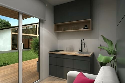 Compact modern kitchen with sliding glass door to patio.